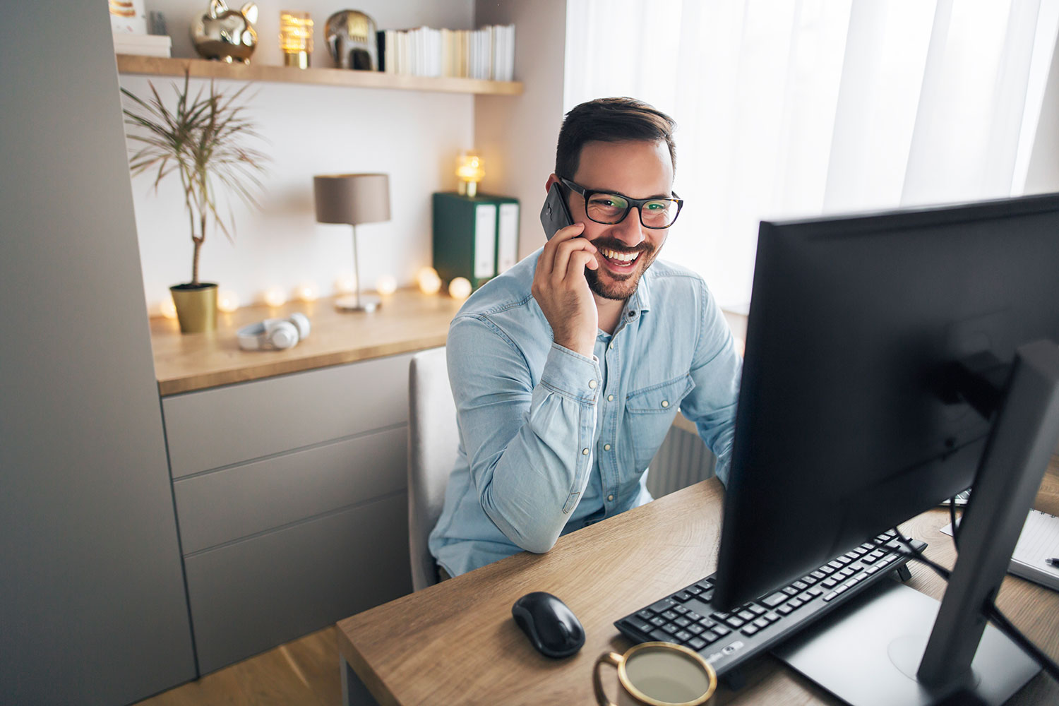 financial planner on phone with client